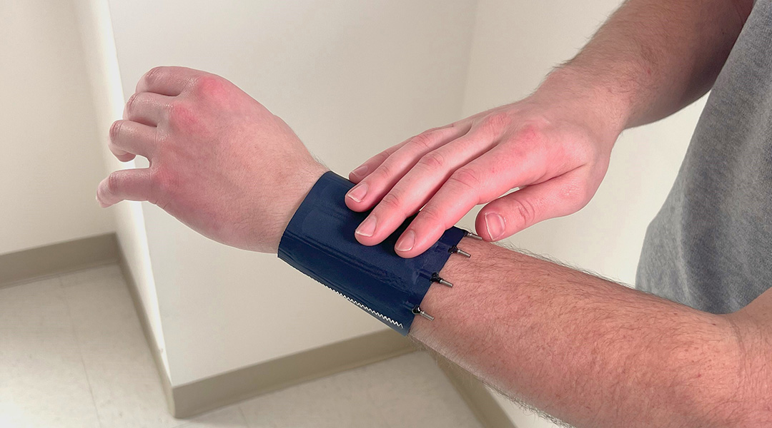 A haptic sleeve been worn by a user.