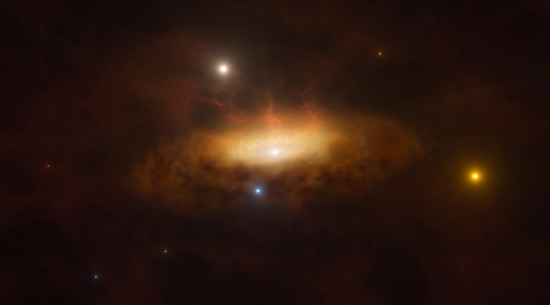 A black hole awakens in the center of a galaxy.