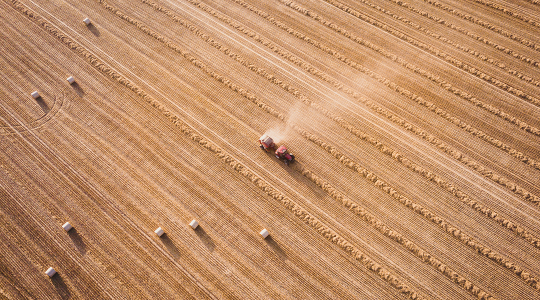 An overhead view of a tractor in a field.