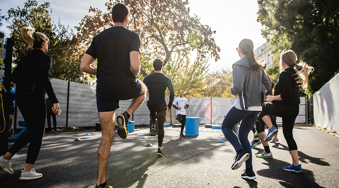 Group exercise in a park.