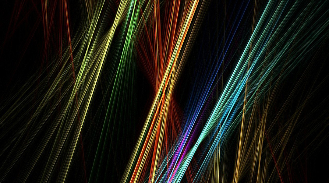 Abstract image of color lines on a black background.