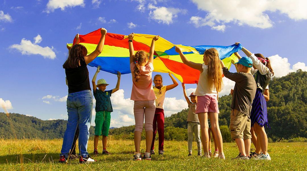 Children playing in a field.